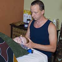 Woman getting scalp massage during body wrap at Scottsdale AZ day spa