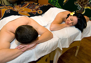 Couples facing eachother during romantic massage