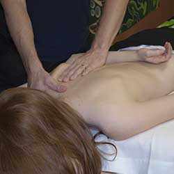Client receiving medical massage at Goodyear, AZ day spa
