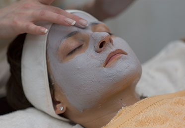 Woman getting spa facial